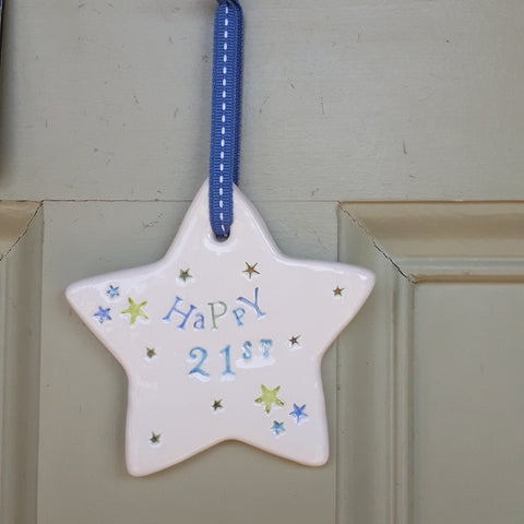 Happy 21st Ceramic Star with Hanging Ribbon by Jamali Annay Designs