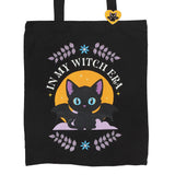 Close up of In My Witch Era Bat Cat Tote Bag with Enamel Pin
