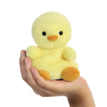 Palm Pals Betsy Chick Plush Aurora World in hand