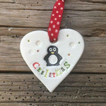 Penguin Christmas Ceramic Heart with Hanging Ribbon by Jamali Annay at Mystical and Magical