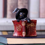 Display of Kitty's Grimoire Book of Spells Figurine in Red