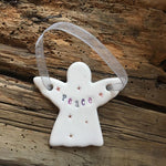 Ceramic Peace Angel with Hanging Ribbon from Mystical and Magical