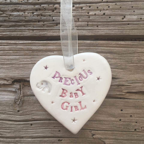 Precious Baby Girl Ceramic Heart with Hanging Ribbon by Jamali Annay